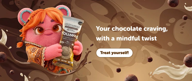 Moka holding a Yoummy snack for a more mindful chocolate craving